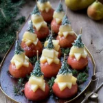 Recette-de-Plateau-de-sapins-de-fromages-aux-poires-pochees